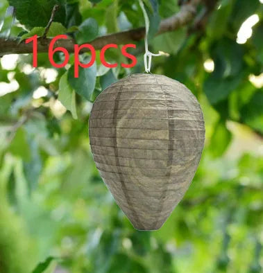 White paper beehive lantern with wire frame measuring 22cm by 28cm