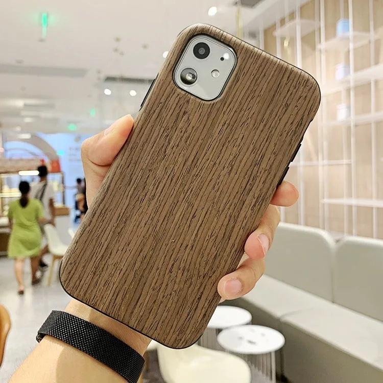 Slim wooden iPhone back cover in natural rosewood, teak, black rose, and walnut finishes