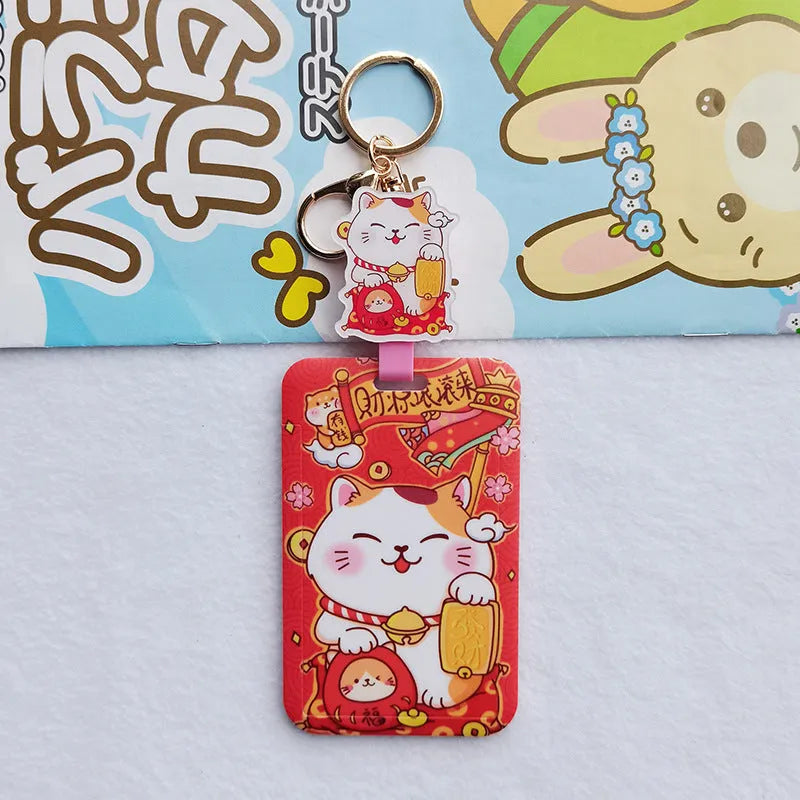 Lucky Cat blessing certificate set showing plastic card sleeve and ferrule pendant in cartoon style.