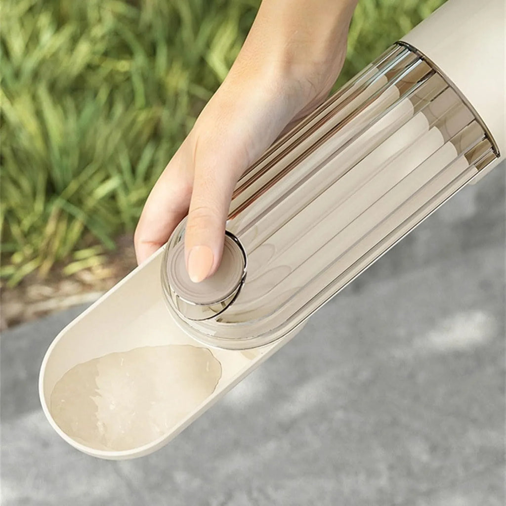 Beige foldable dog water bottle with food dispenser base, shown with dimensions.