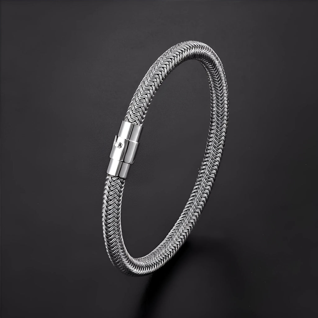 Men's geometric titanium steel wire bracelet with a magnetic clasp shown on a wrist.