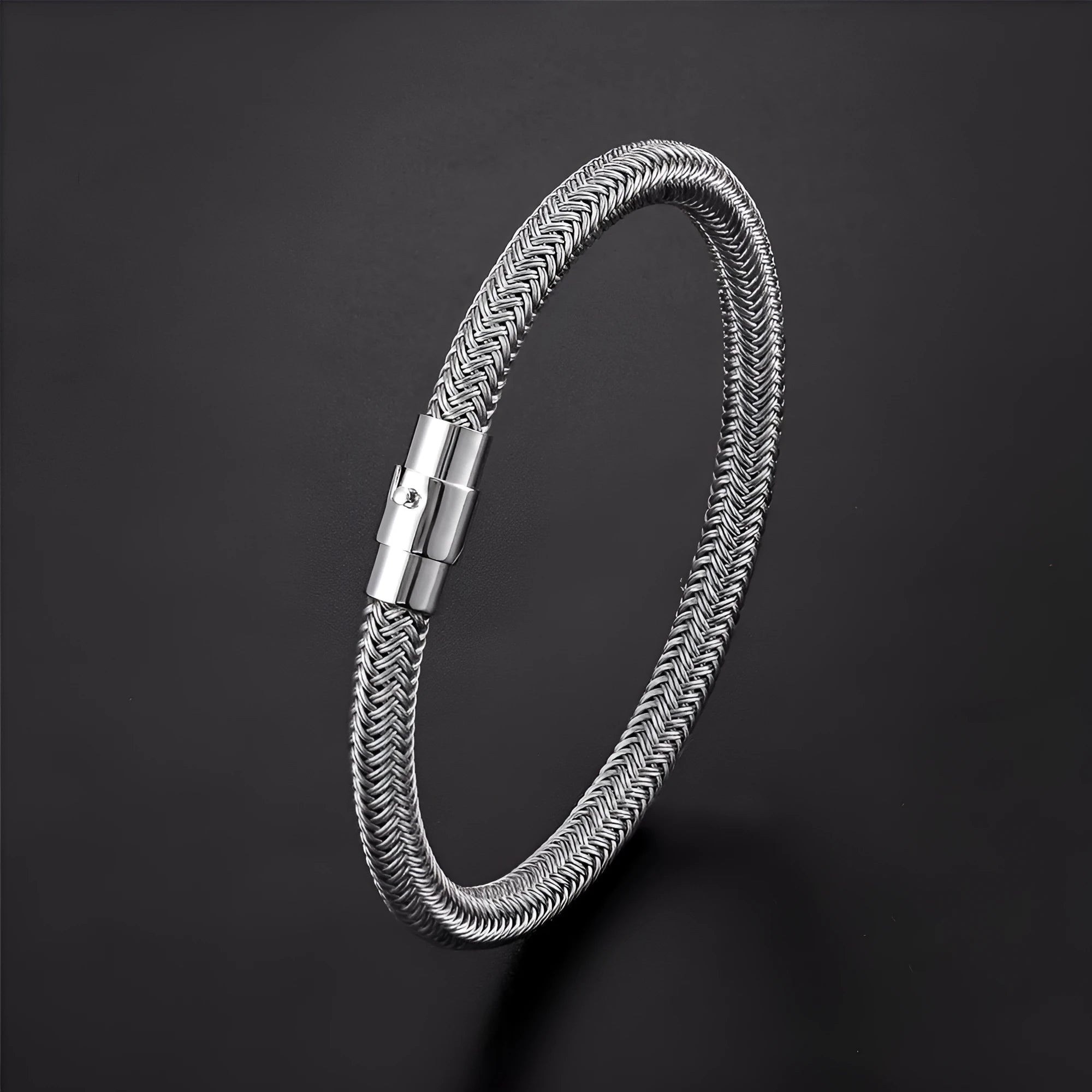 Men's geometric titanium steel wire bracelet with a magnetic clasp shown on a wrist.