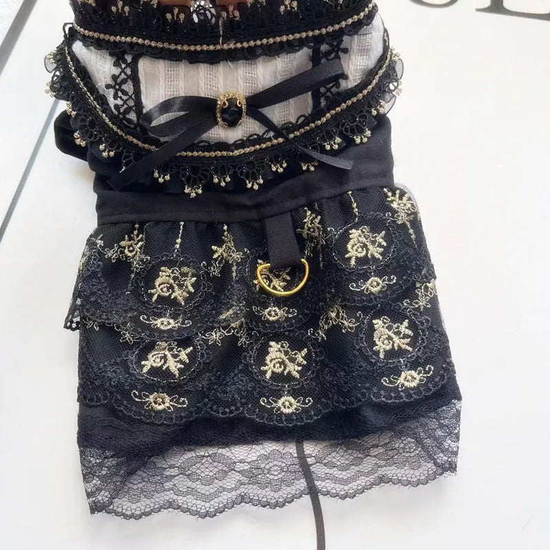 Gold Gothic princess style dress for a small dog or cat on a mannequin.