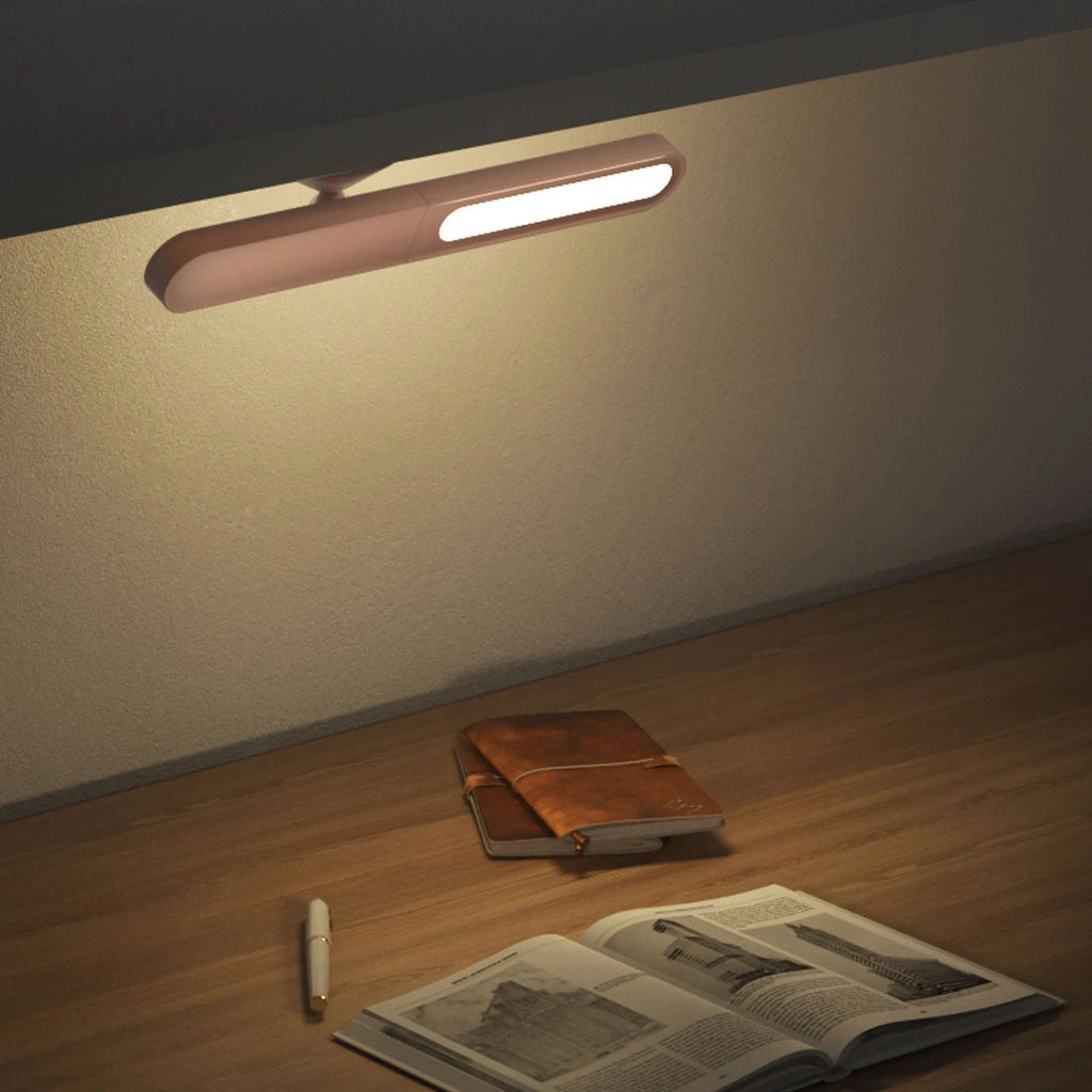 Geometric desk lamp with magnetic base in white or khaki colour