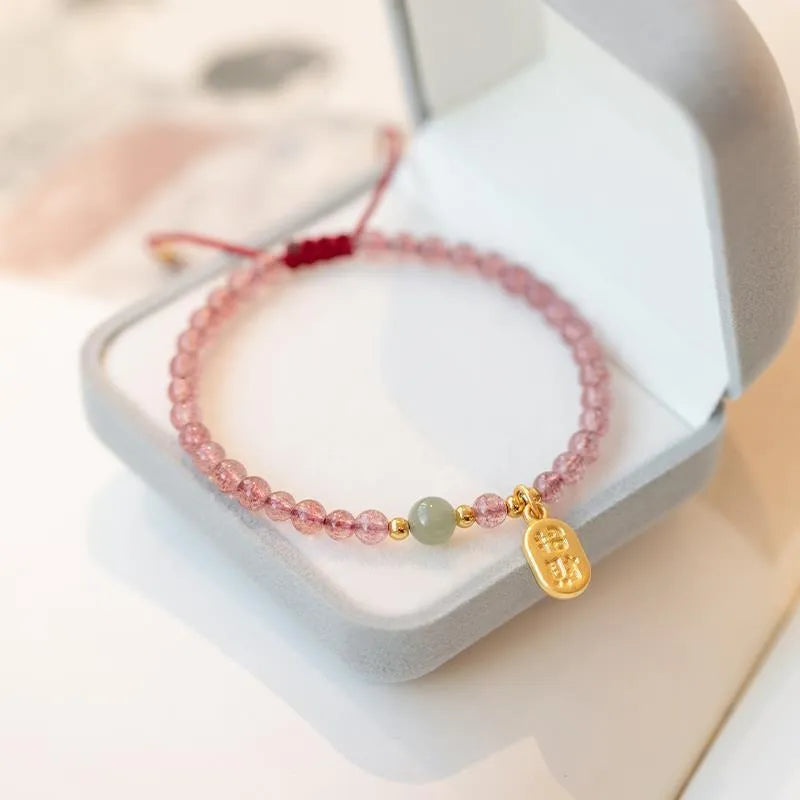 Red rope hand-woven bracelet with crystal centrepiece and adjustable wristband