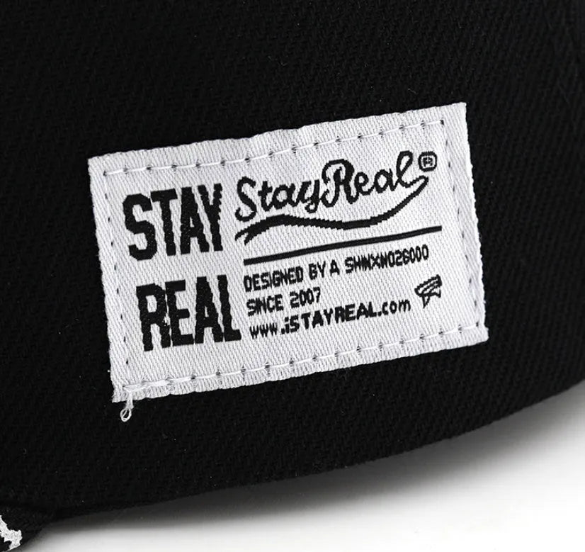 Embroidered letter baseball hat in cotton with adjustable strap, dome crown, black and white colour options