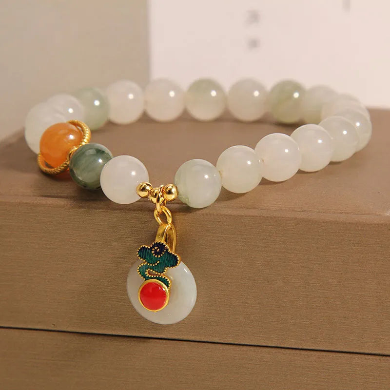 Ice jade women's bracelet with Xiangyun peace buckle and pearl decorative elements