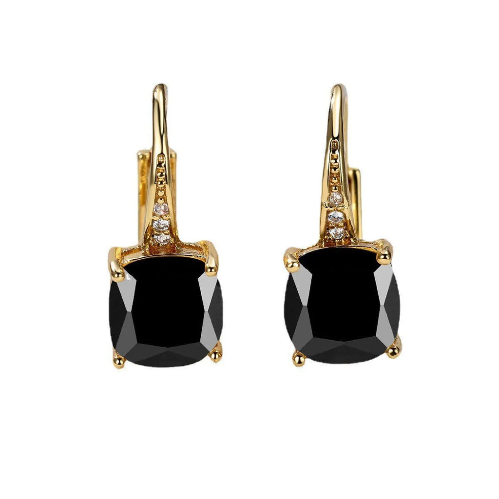 Square geometric ear hook earrings with zircon stones in an electroplated copper setting.