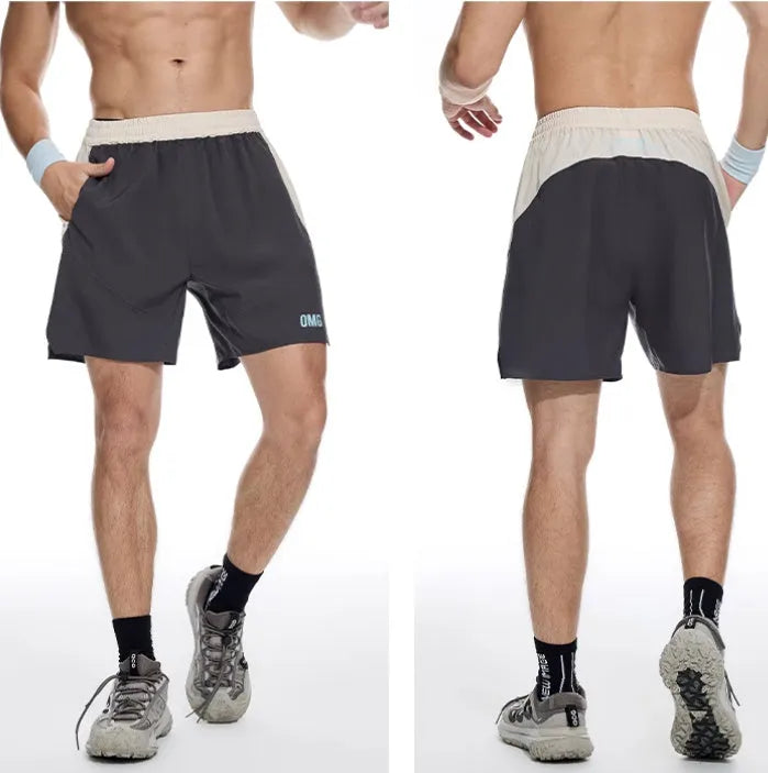 Men's loose dark grey workout shorts with an elastic and lace-up waistband for lifting.