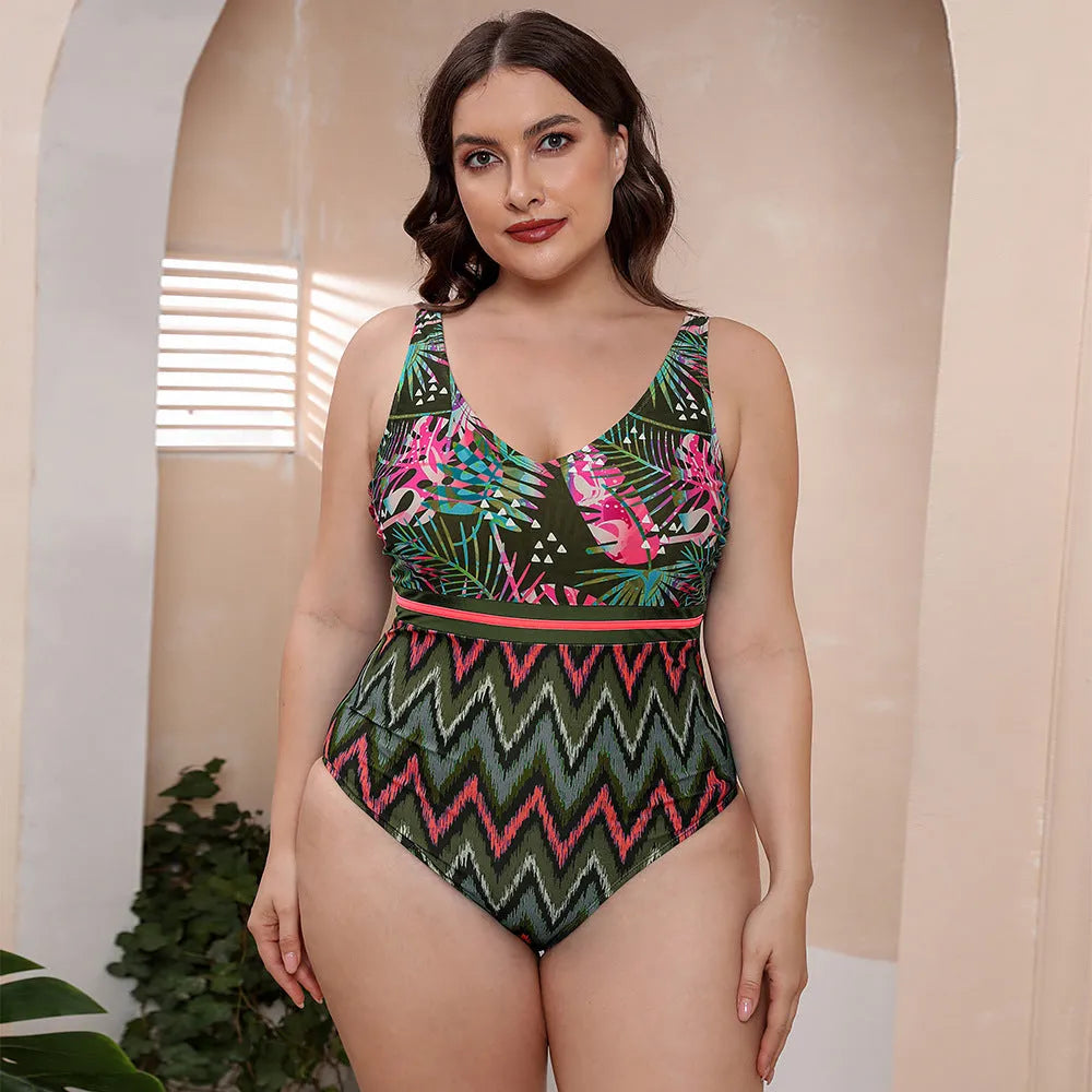 Women's blue printed one-piece swimsuit with spaghetti straps and a striped vest design