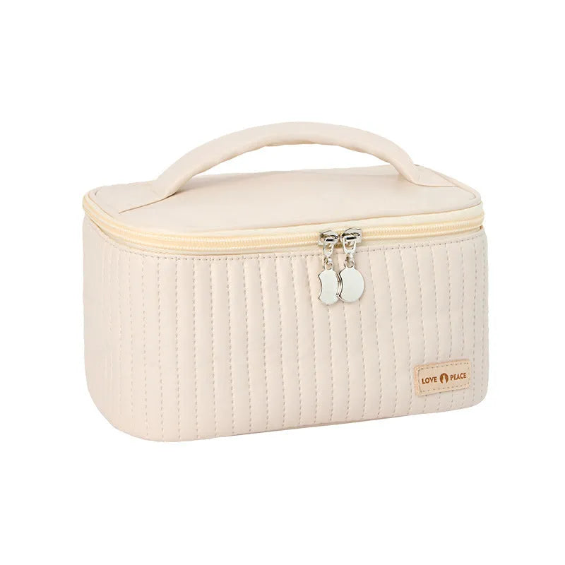 Open-top makeup bag in PU leather showing six colour options including pink, coffee, and light blue
