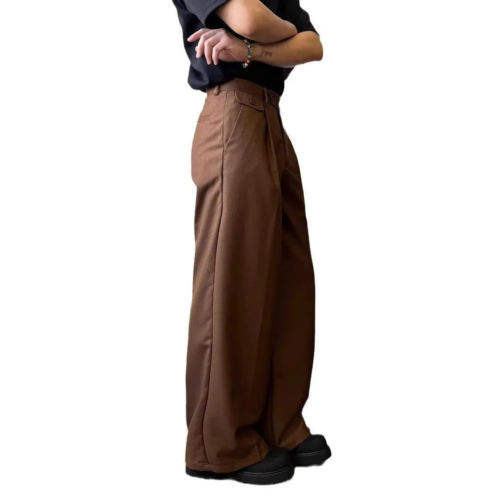 Men's brown straight-leg casual trousers with wide-leg drape fit on hanger