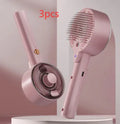 Ceramic white pet grooming brush with UV sterilisation light and spray mist function for dog and cat hair removal