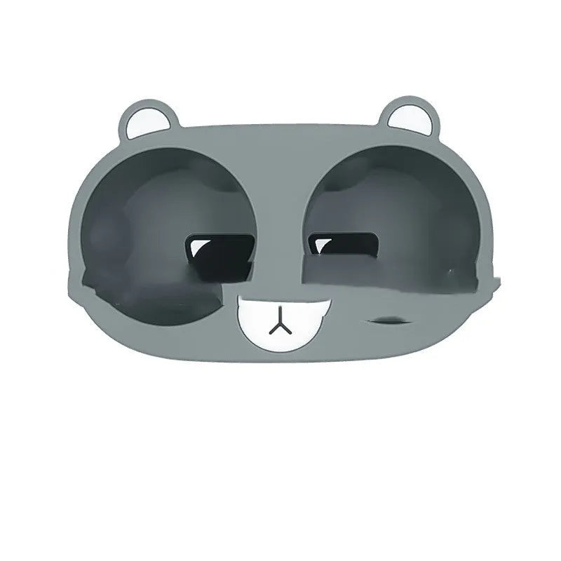 Grey silicone anti-slip insert for a car centre console cup holder.