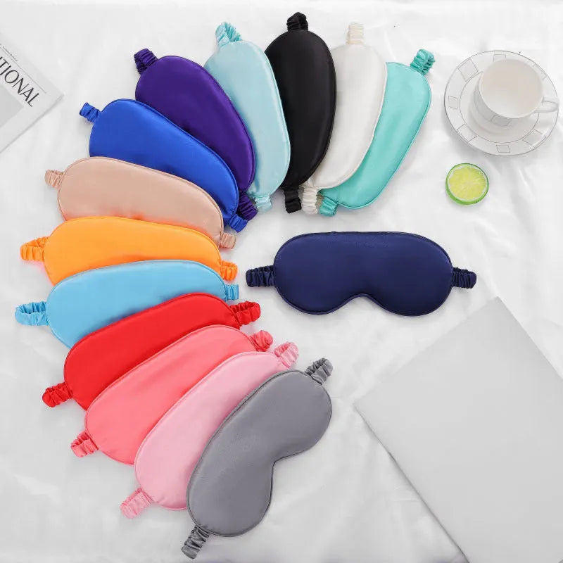 Double-sided silk-like eyeshade sleep mask in rayon elastic satin showing multiple colour options