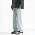 Men's light blue straight leg jeans with button waist closure on size chart showing S to 3XL options