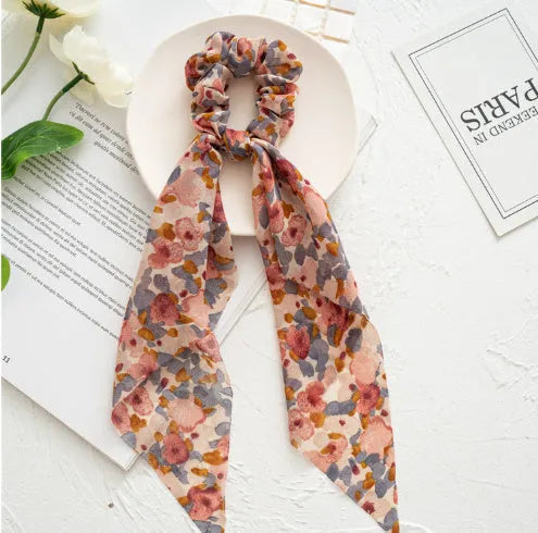 Spring dark green cloth hair tie with large intestine ring design and floral bandeau decoration