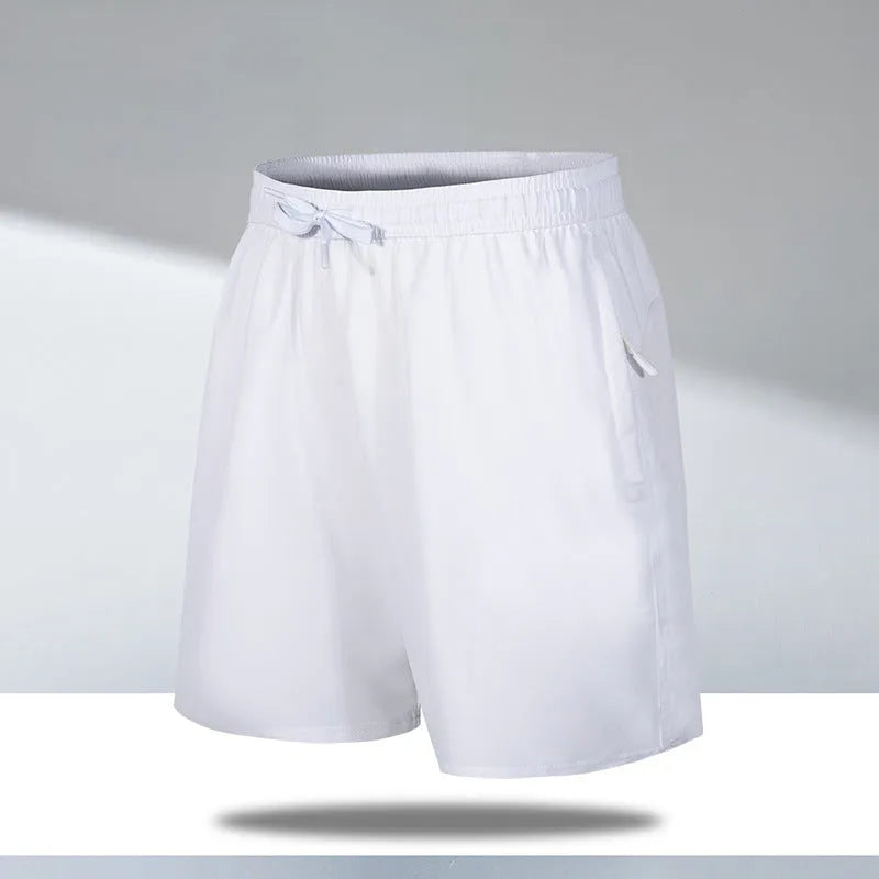 Man wearing loose black quick-dry sports shorts with an elastic waistband