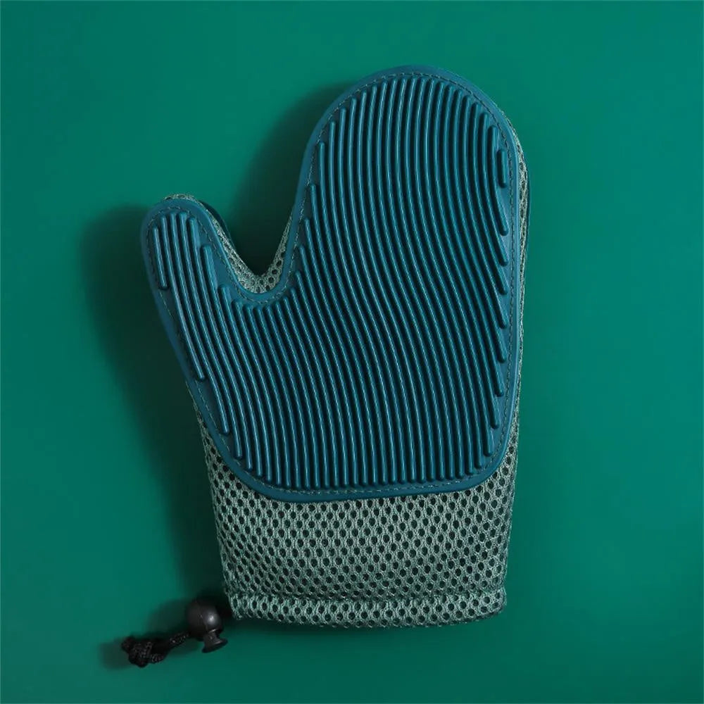 Right-handed mesh pet grooming glove for removing hair from cats and dogs on a dark blue background.