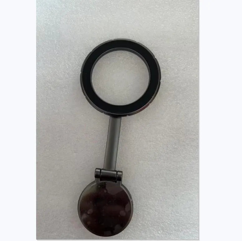 All-metal magnetic car phone mount with foldable arms in Qian colour on dashboard