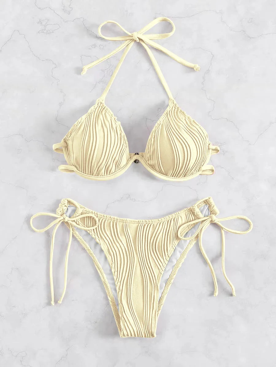 Women's apricot coloured bikini swimsuit with underwire support on a mannequin.