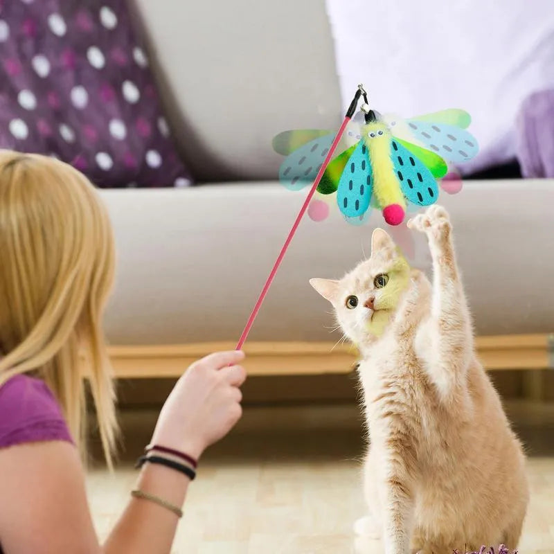 Blue, yellow, and pink dragonfly cat wand toy with bell on a long plastic stick.