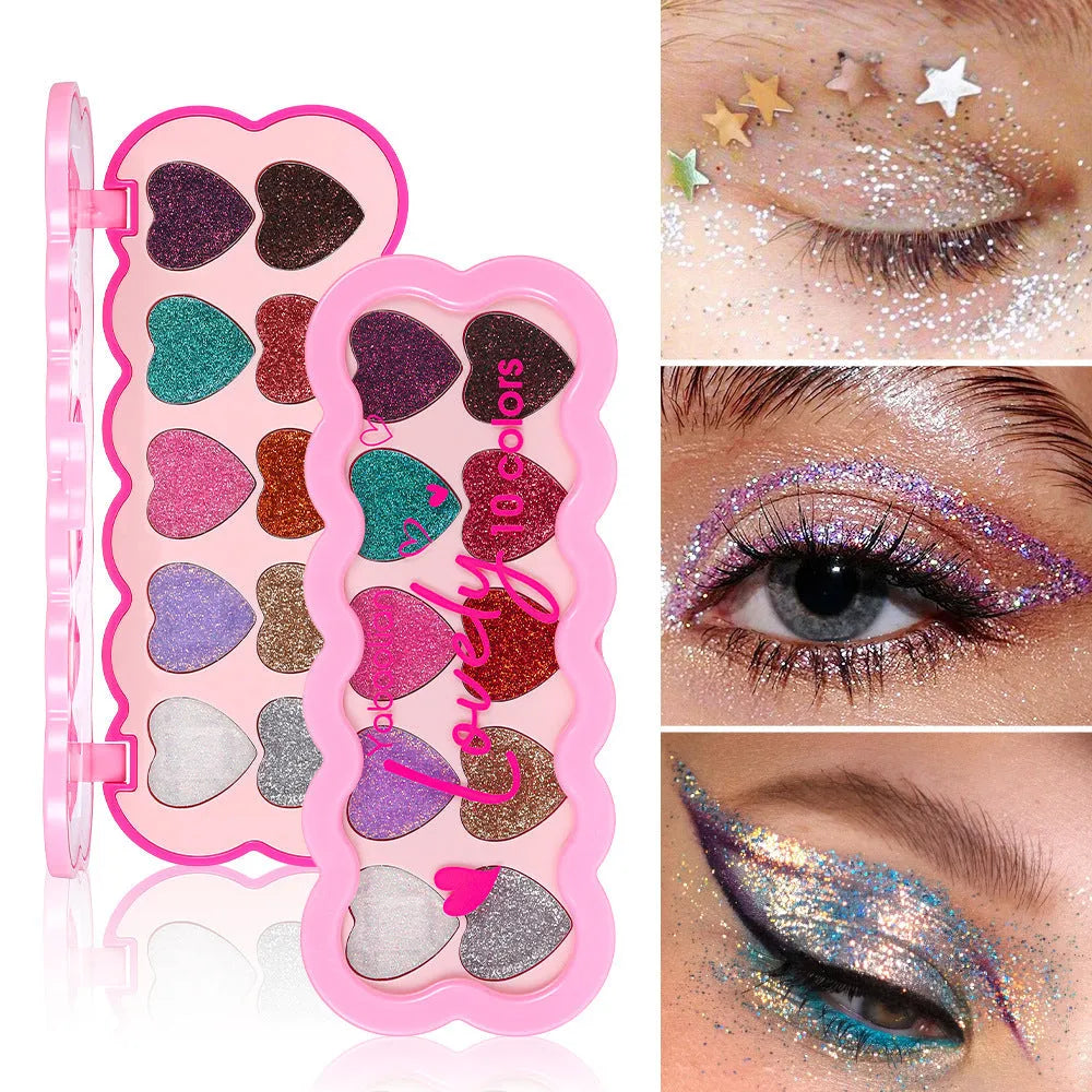 Pearlescent heart-shaped ten-colour sequin eyeshadow palette open, showing pink, blue, black, and coral shades.