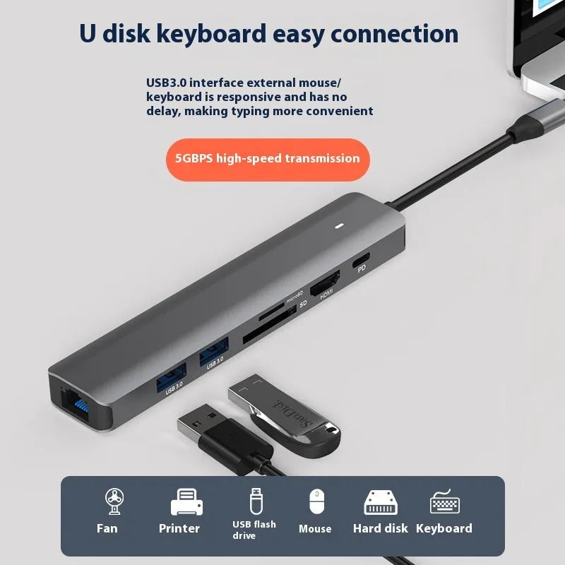 LQT-LH07 7-in-1 USB-C hub with HDMI port, USB-A ports, and SD/TF card reader slots for laptops.