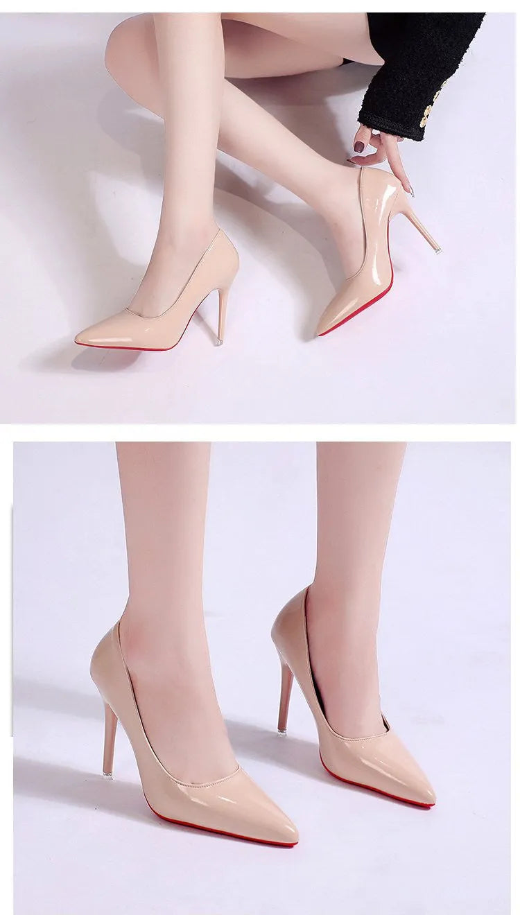 Women's black pointed toe stiletto heel pumps with a shallow mouth design on a plain background.