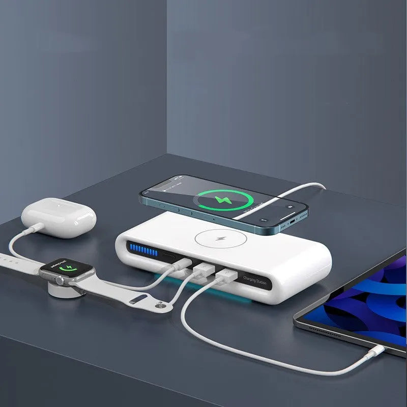 White rectangular desktop wireless charging pad with integrated multi-colour atmosphere lamp.
