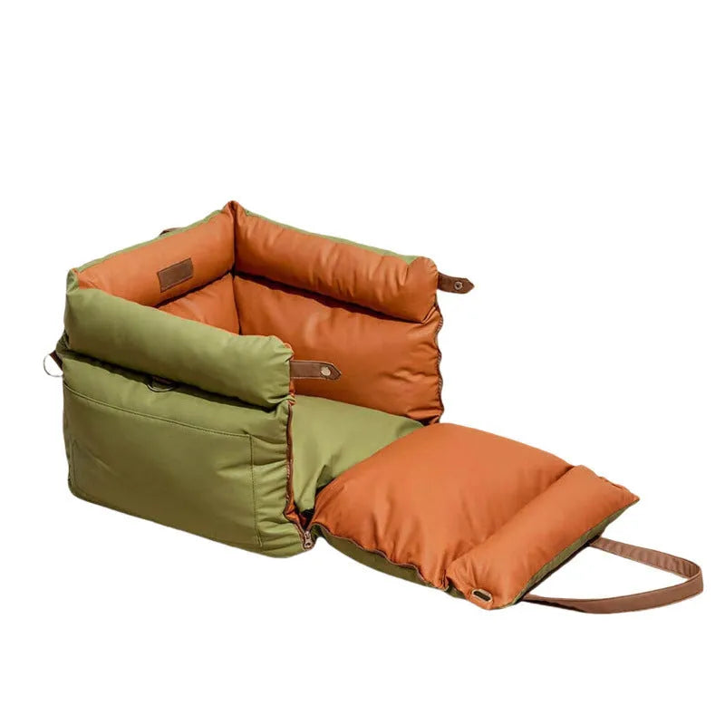 Green waterproof dog car bed with removable washable cover, shown on a car seat.
