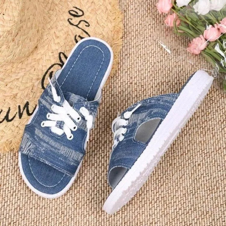 Blue Roman style women's canvas slippers with flat design and rubber sole
