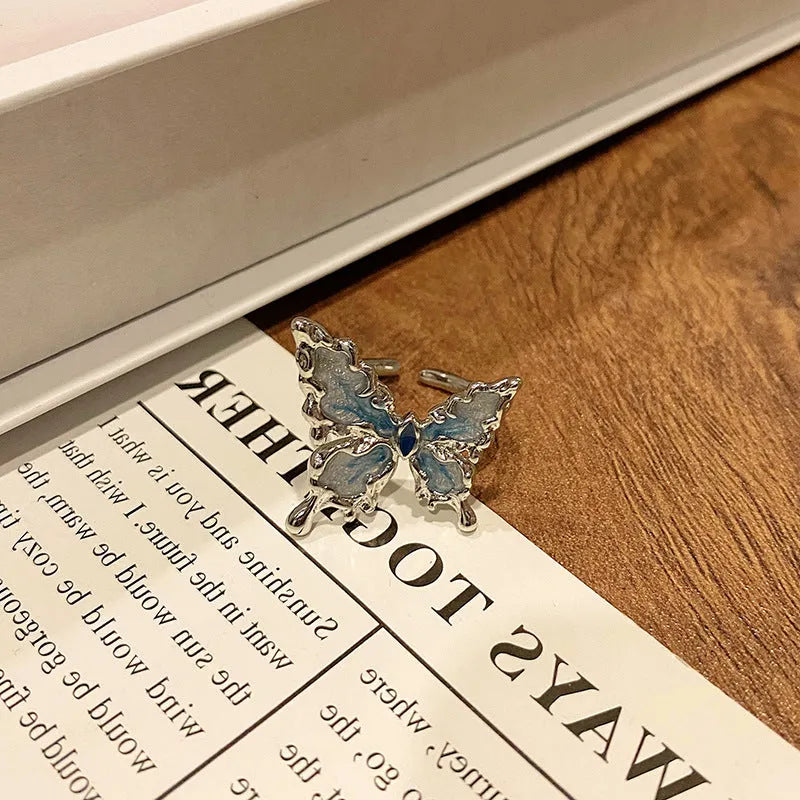 Butterfly design copper ring with oil-drip textured finish in women's jewellery