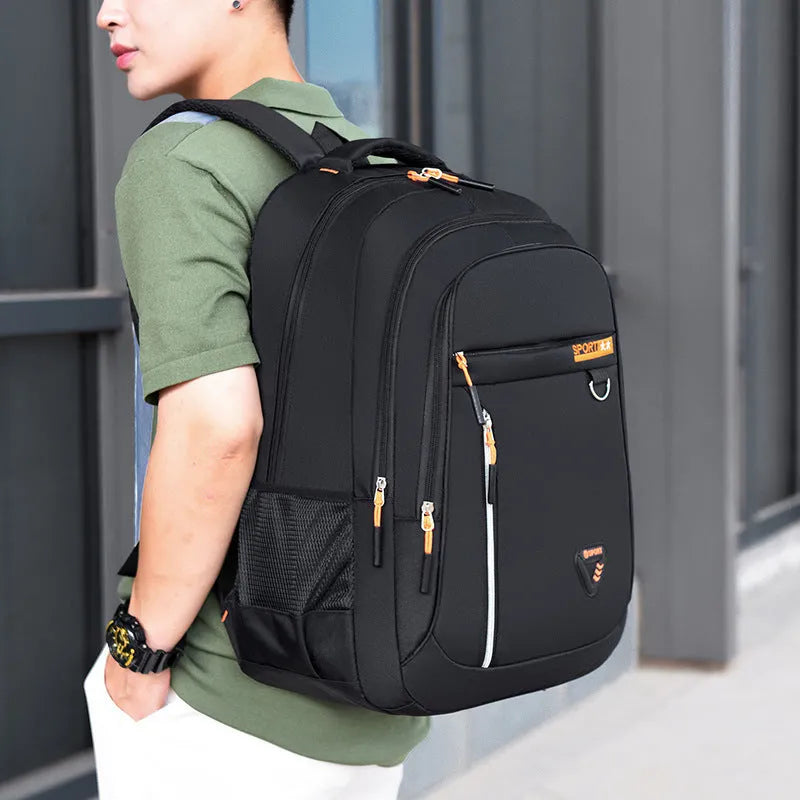 Men's Oxford cloth schoolbag in red colour with letter pattern and air pillow burden reduction belt