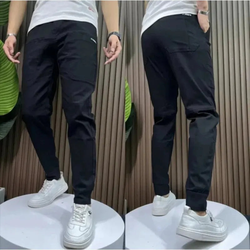 Men's ice silk stitching six-pocket high elastic casual pants in khaki colour