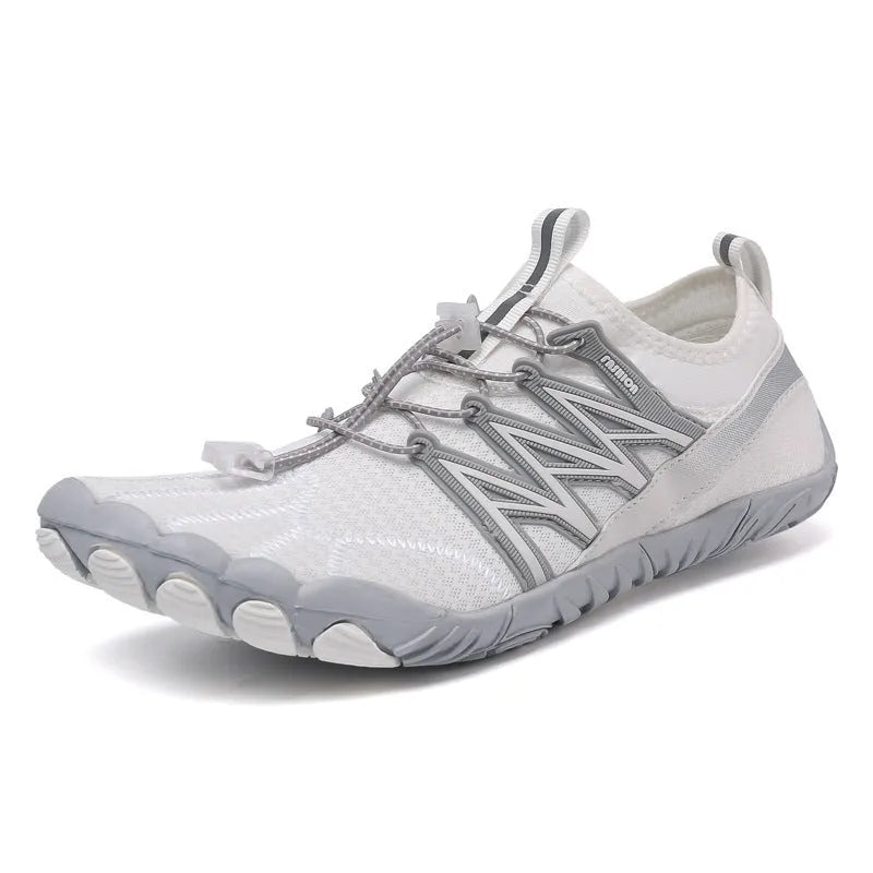Indoor fitness training sneakers in multiple colours with striped pattern and rubber sole.