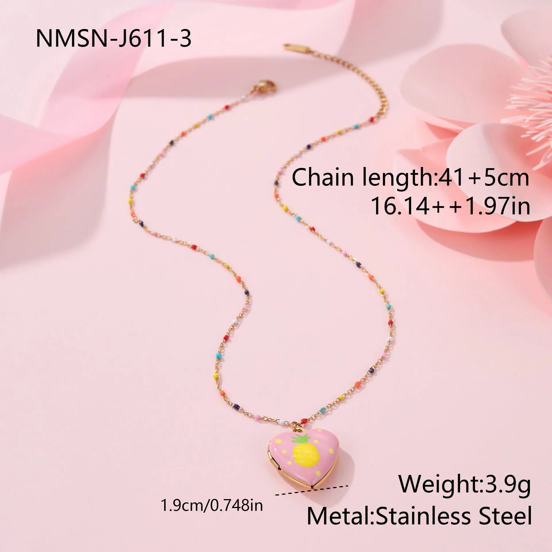Women's stainless steel necklace with 18K gold plating showing heart pendant with fruit designs