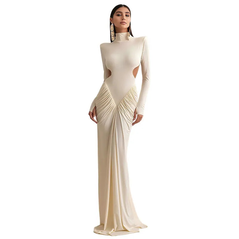 Women's slim fit high collar long sleeve dress with pleated backless detail in light apricot colour.