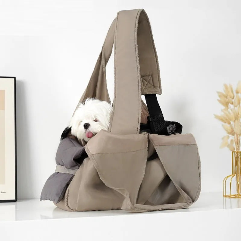 Apricot coloured cloth pet handbag measuring 41cm by 16cm by 28cm