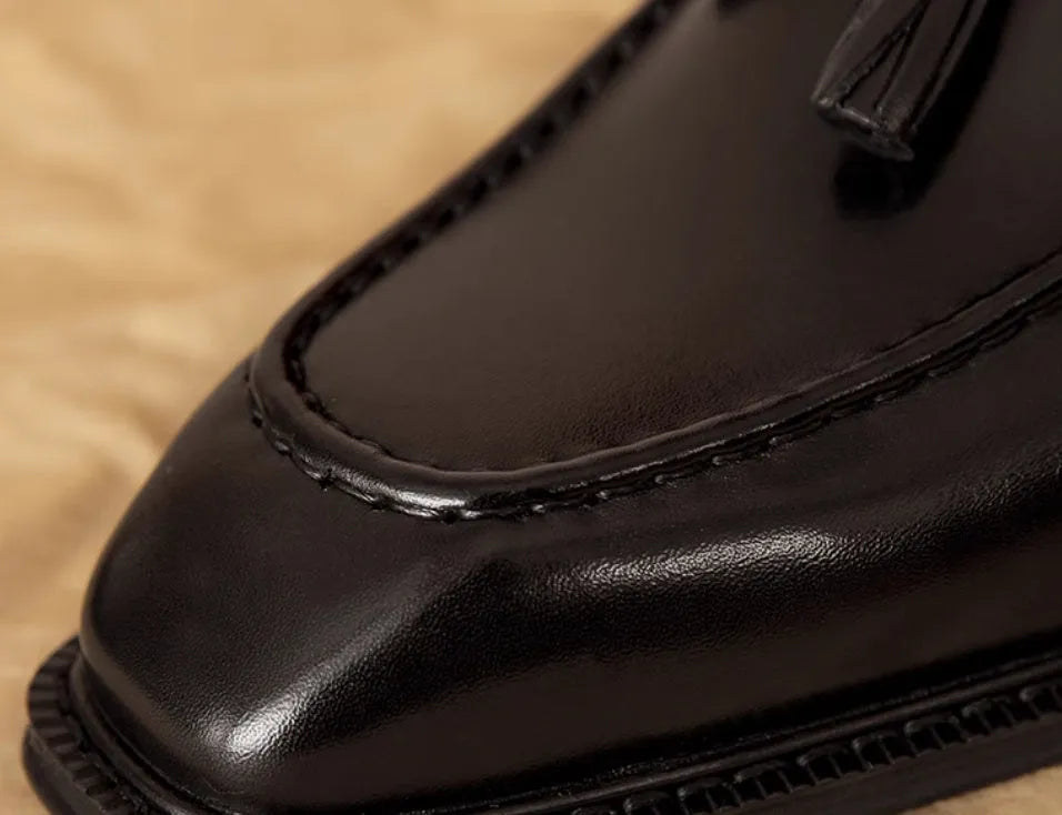 Men's black genuine leather slip-on loafers with rubber sole and pigskin lining