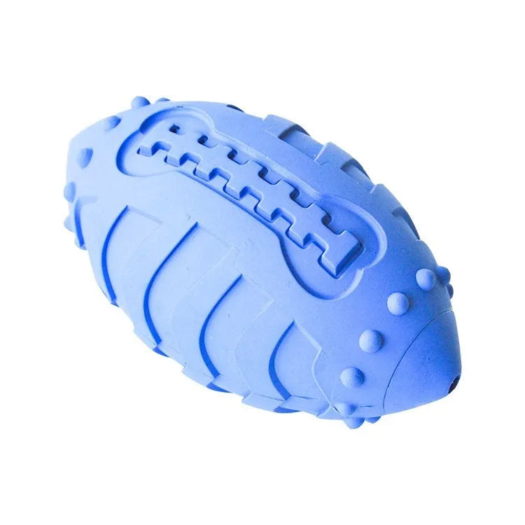 Light green bite-resistant rubber rugby ball dog toy for chewing and interactive training.