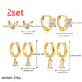Copper electroplated geometric earring set with star designs in gold or silver tone options
