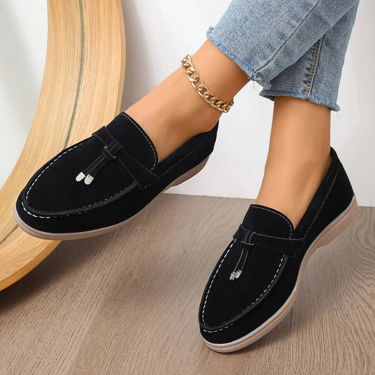 Canvas gommino slip-on loafers with platform heel in black, apricot, and brown colours