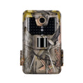 Camouflaged outdoor trail camera showing lens, infrared LEDs, and compact body for wildlife and security monitoring.