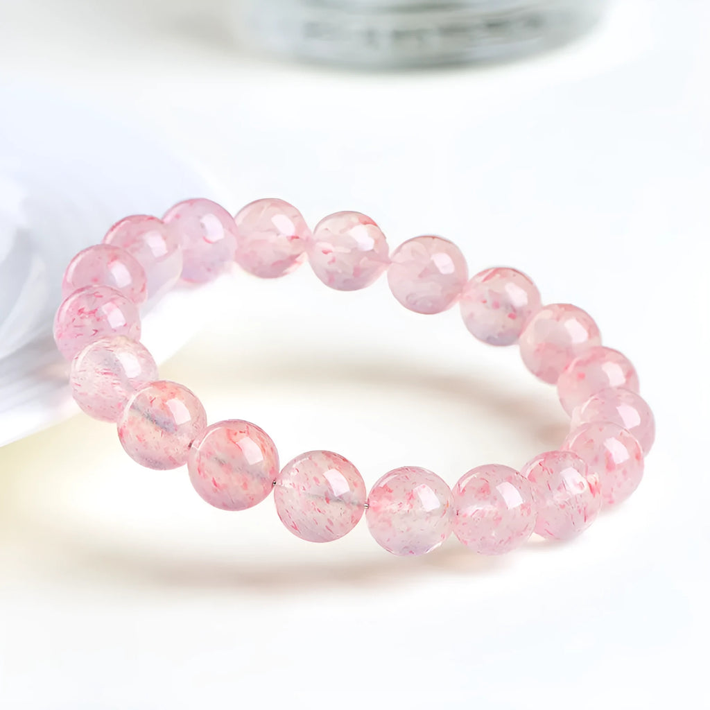 White strawberry quartz crystal bracelet with 10-10.8mm geometric beads
