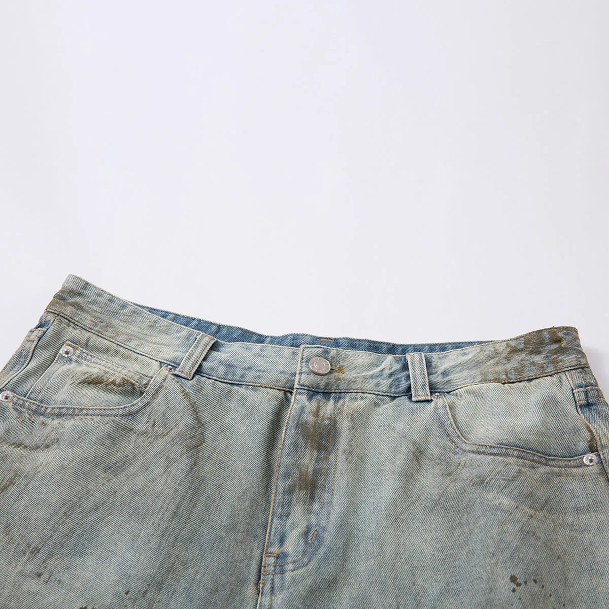 Men's blue cropped denim jeans with straight leg design and zipper fly in street fashion style