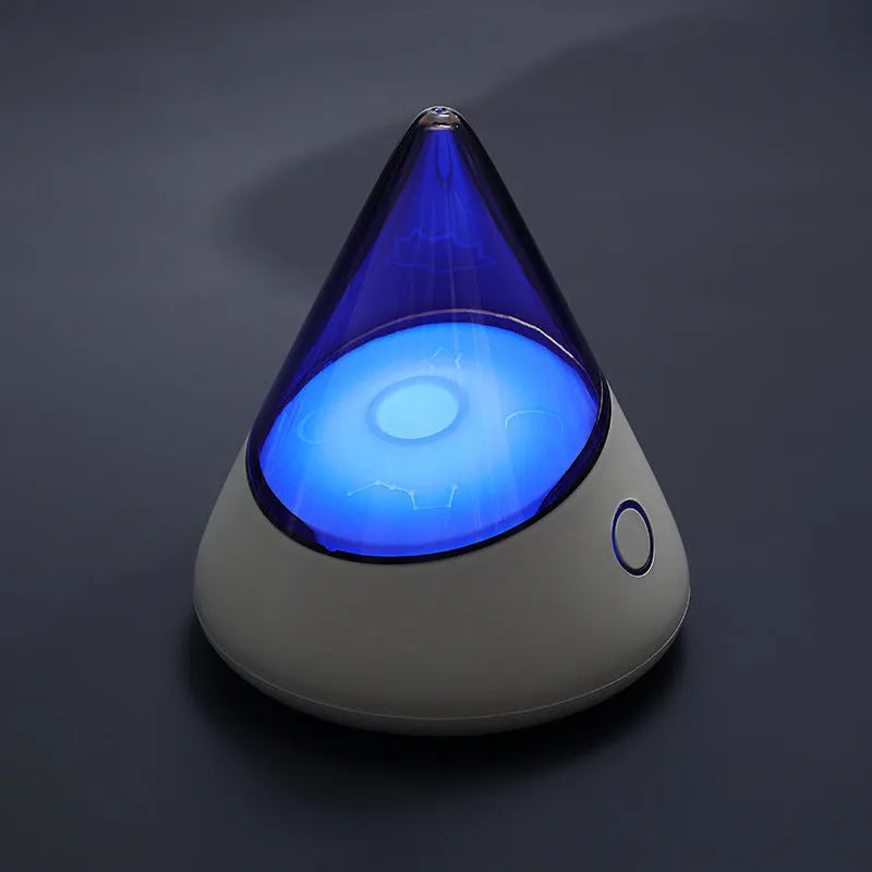 M3 small night lamp in colourful blue with geometric stereo design on a table