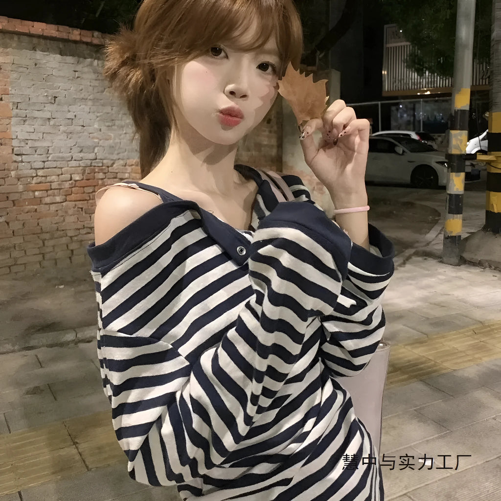 Dark blue Korean-style oversized women's t-shirt with embroidery and stripe details on long sleeves