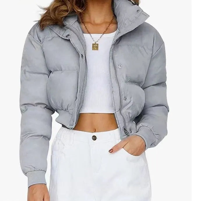 Women's loose fit polyester leisure jacket in blue, grey, black or milky white with long sleeves
