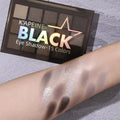 15-colour Night Elf eye shadow palette showing matte and shimmer pans in brown, blue, gray, and black shades.
